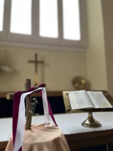 Cross and prayer